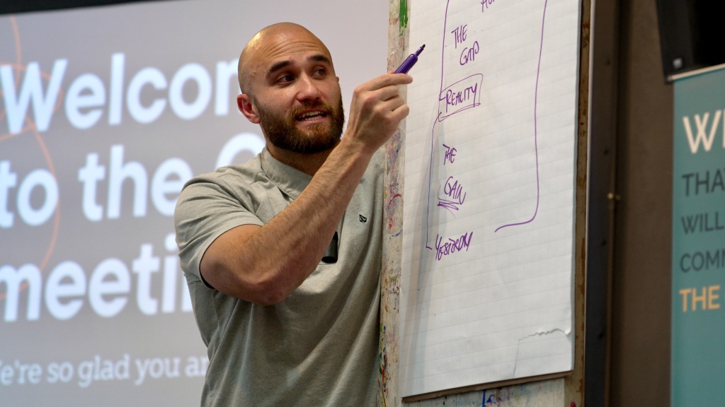 Chris working with a group